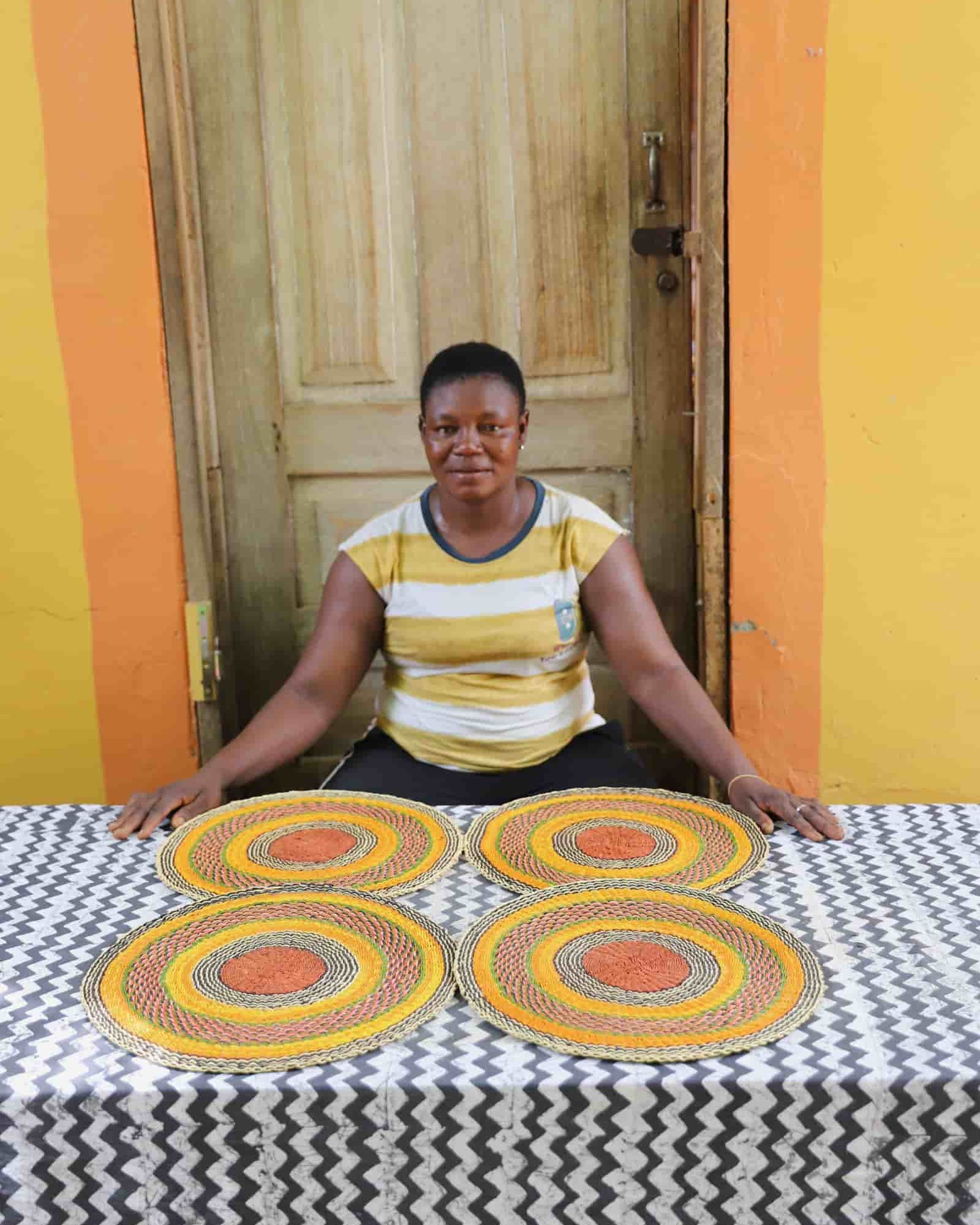 Set of 4 large placemats in yellow, orange and brown concentric weave bands