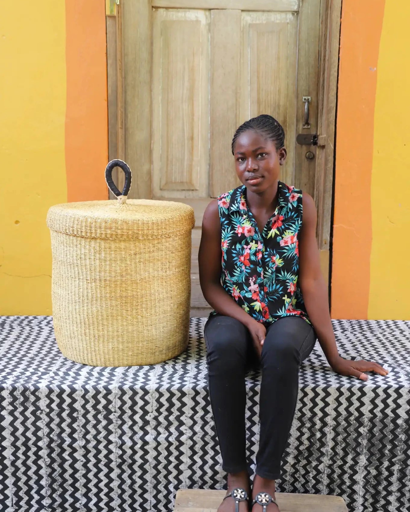 Lidded Laundry Basket (Medium) by The Baba Tree. Handwoven elephant grass with leather handle. Premium Bolgatanga artisan decor.