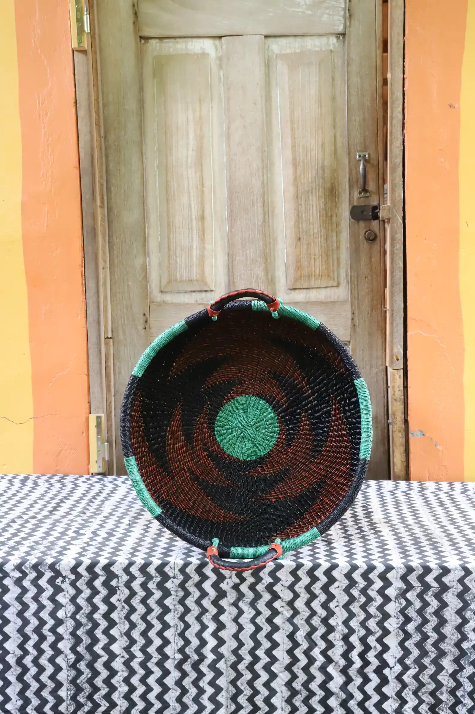 Woven Tray Wall Decor (Large) by The Baba Tree. Premium elephant grass tray with leather handles. Bolgatanga artisan craftsmanship.