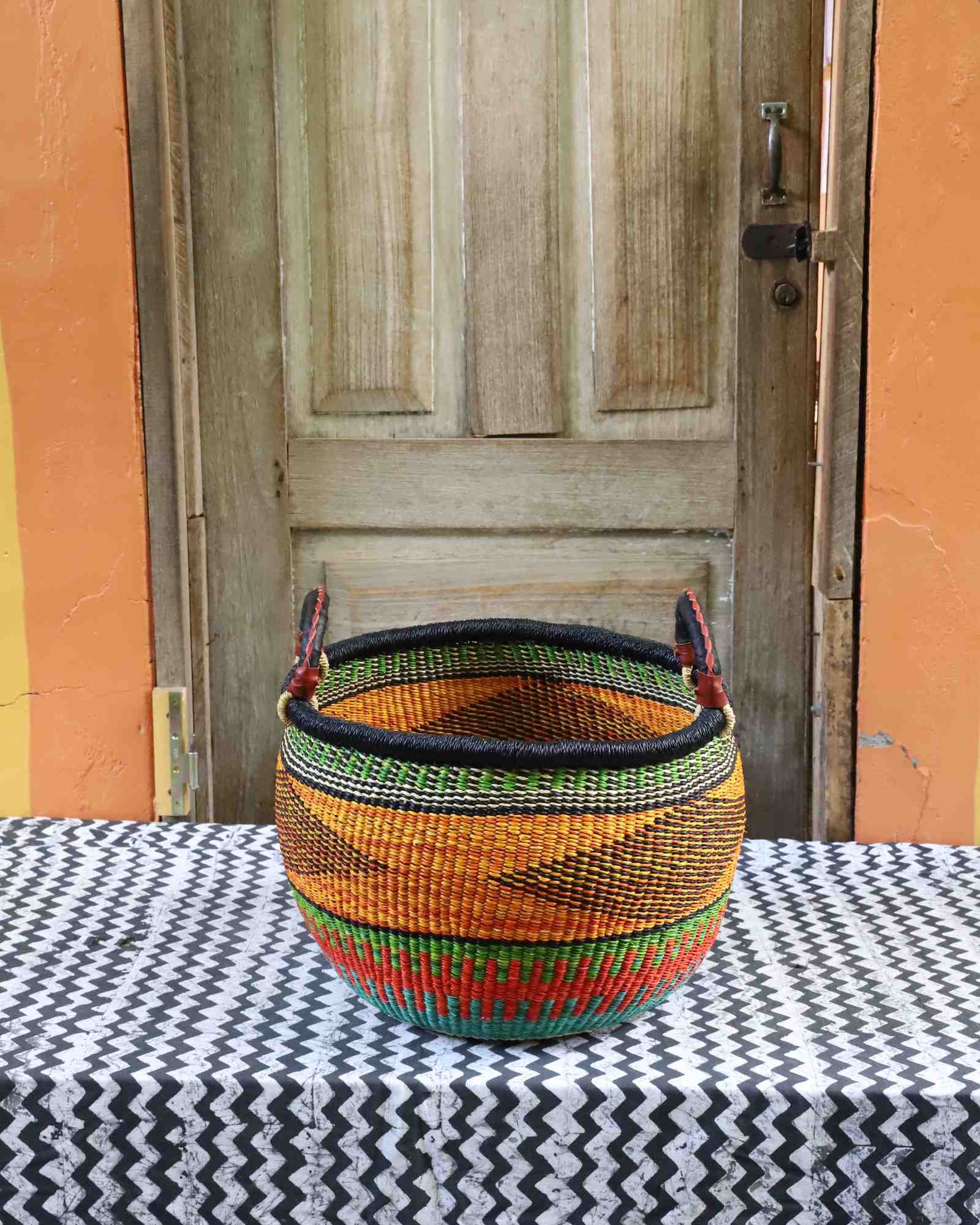 Handwoven Bolga storage basket, large round with leather handle and woven lid