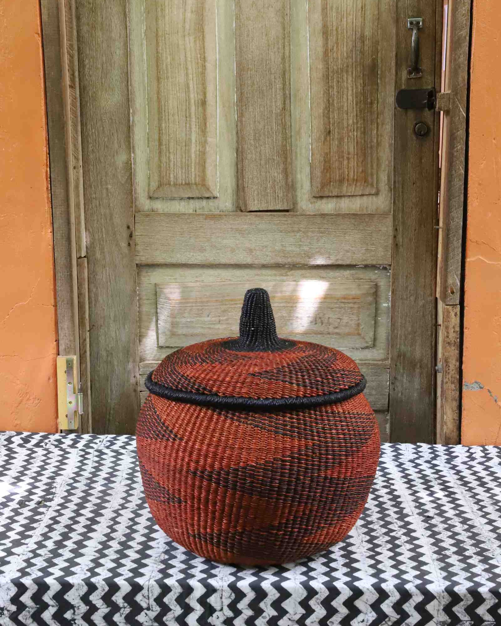 Round handwoven African storage basket, medium, globe form