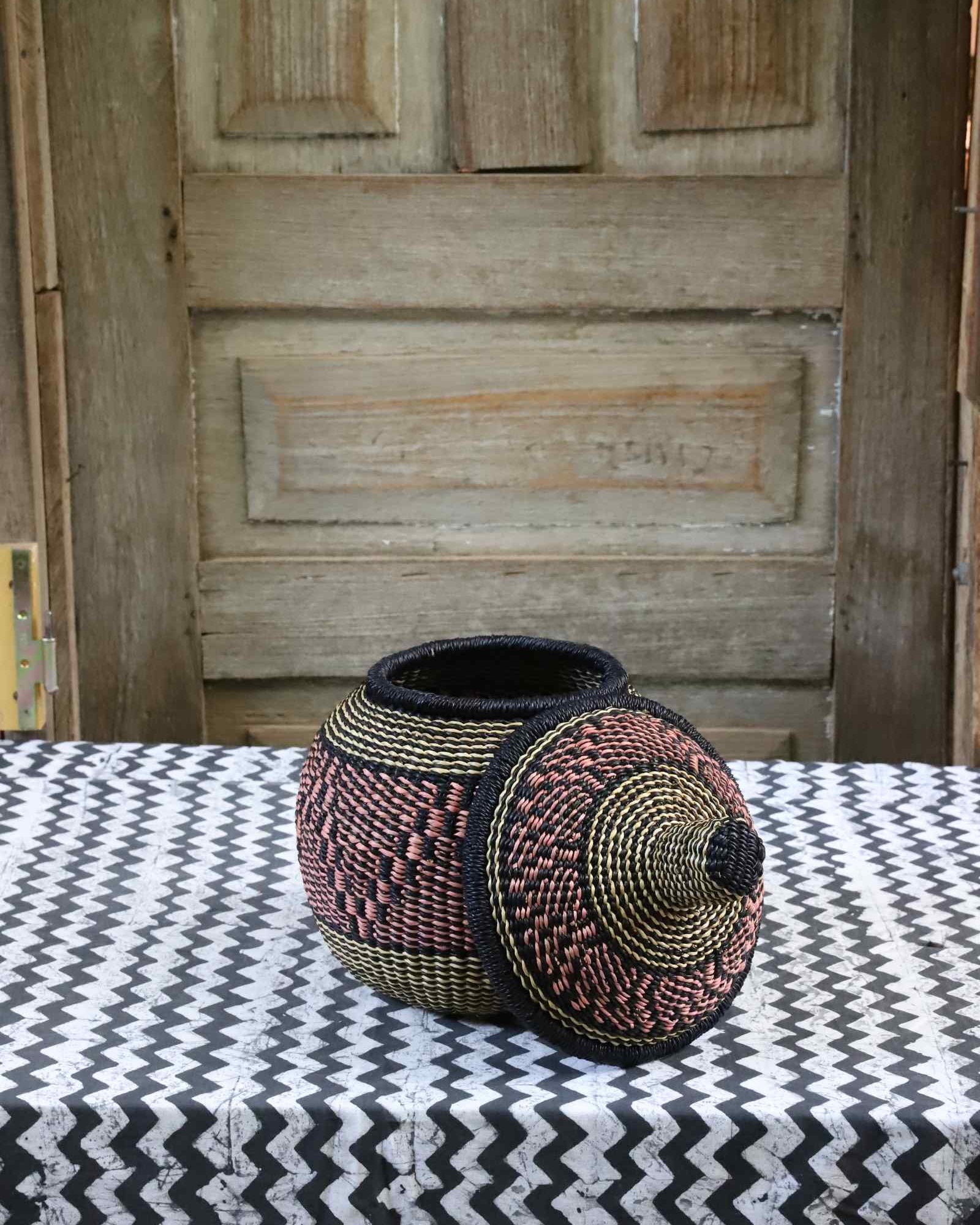Small Orbit handwoven storage basket, alternate angle showing woven form