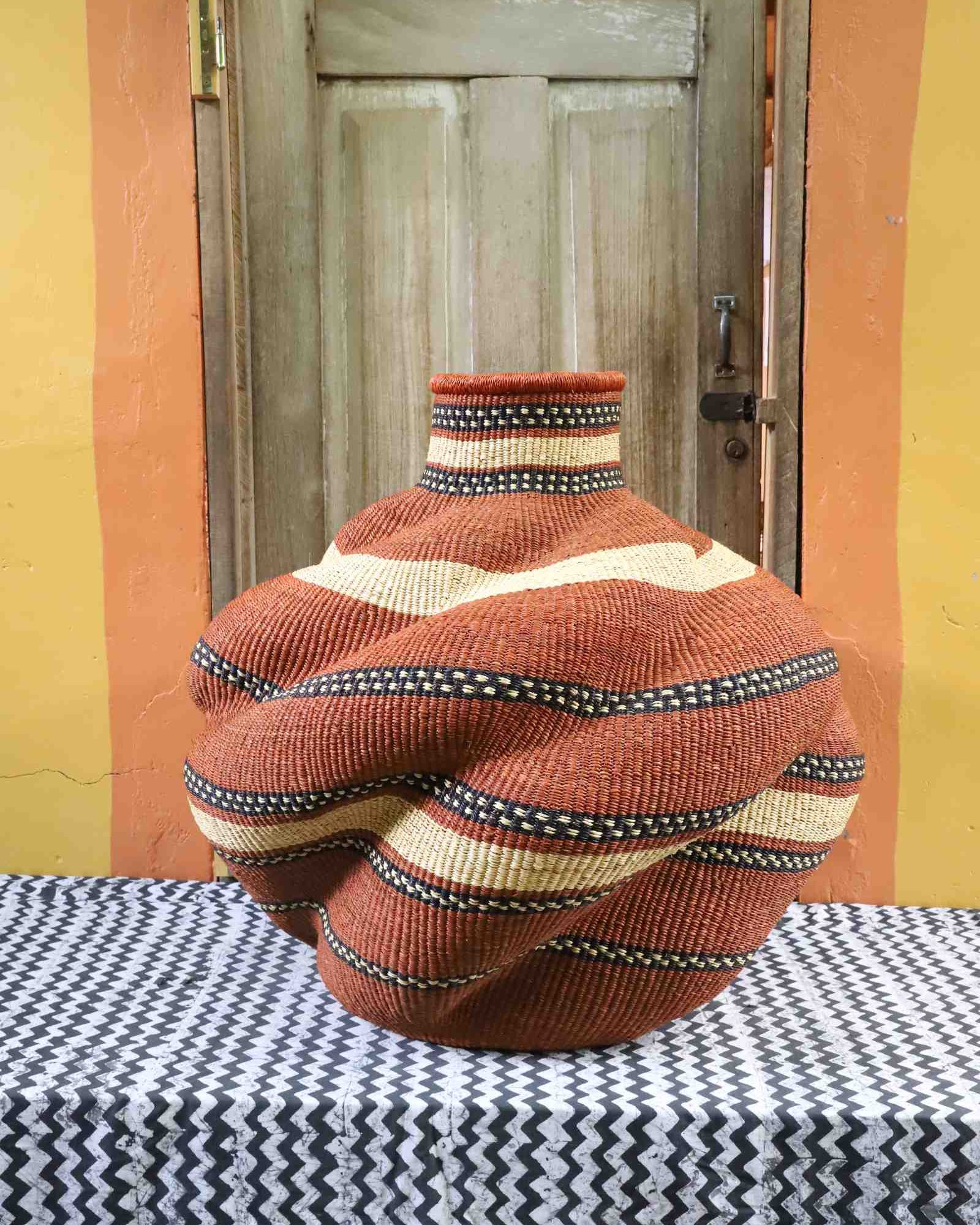 Large De-engo handwoven art basket, alternate angle of woven form