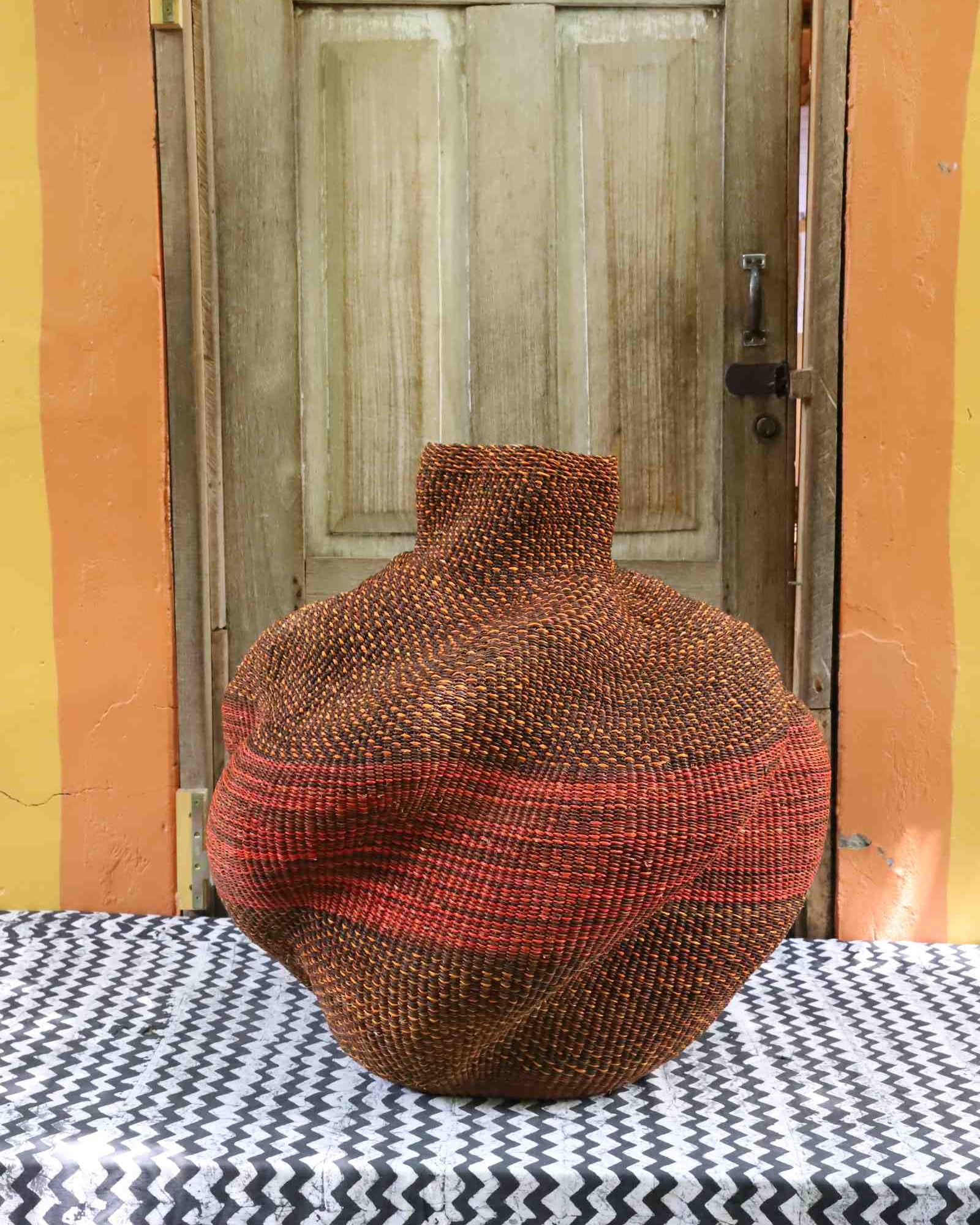 Medium Yoomelingah-yure Bolga basket, angled view of sculptural lobed form