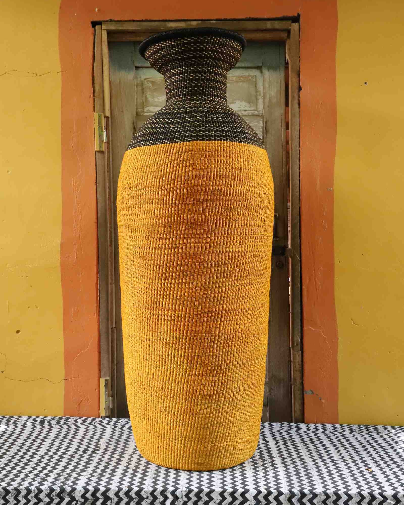 Large handwoven Bolga art basket in earthen woven form