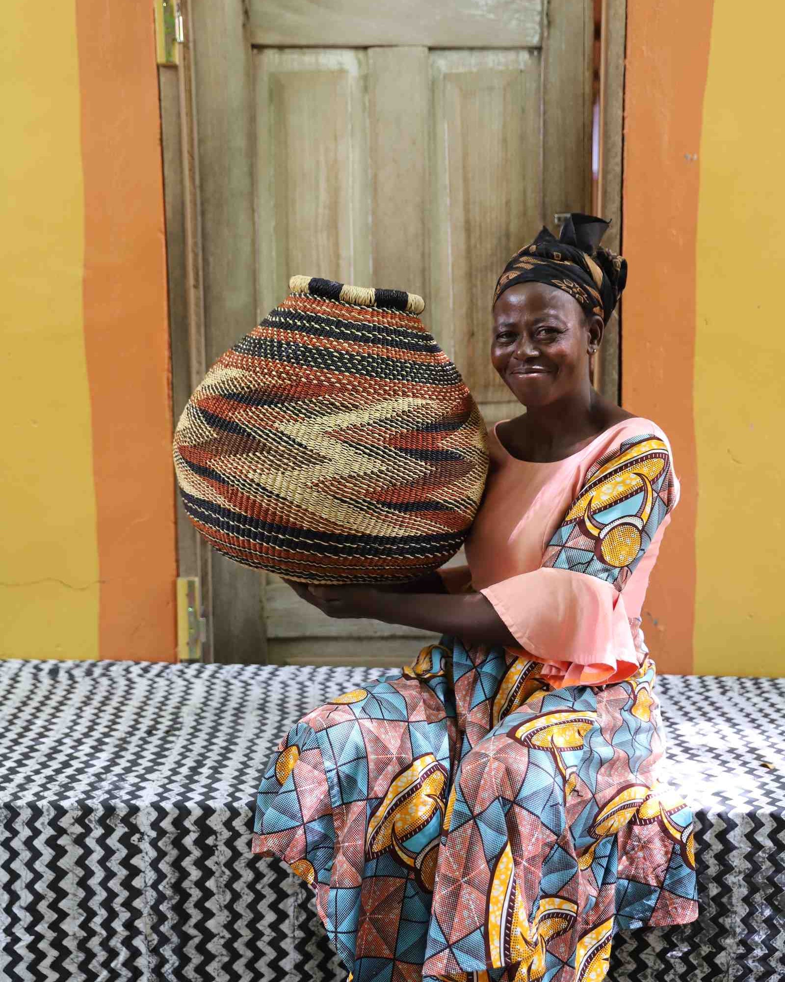 Kenkia handwoven African basket with geometric pattern in a styled home setting