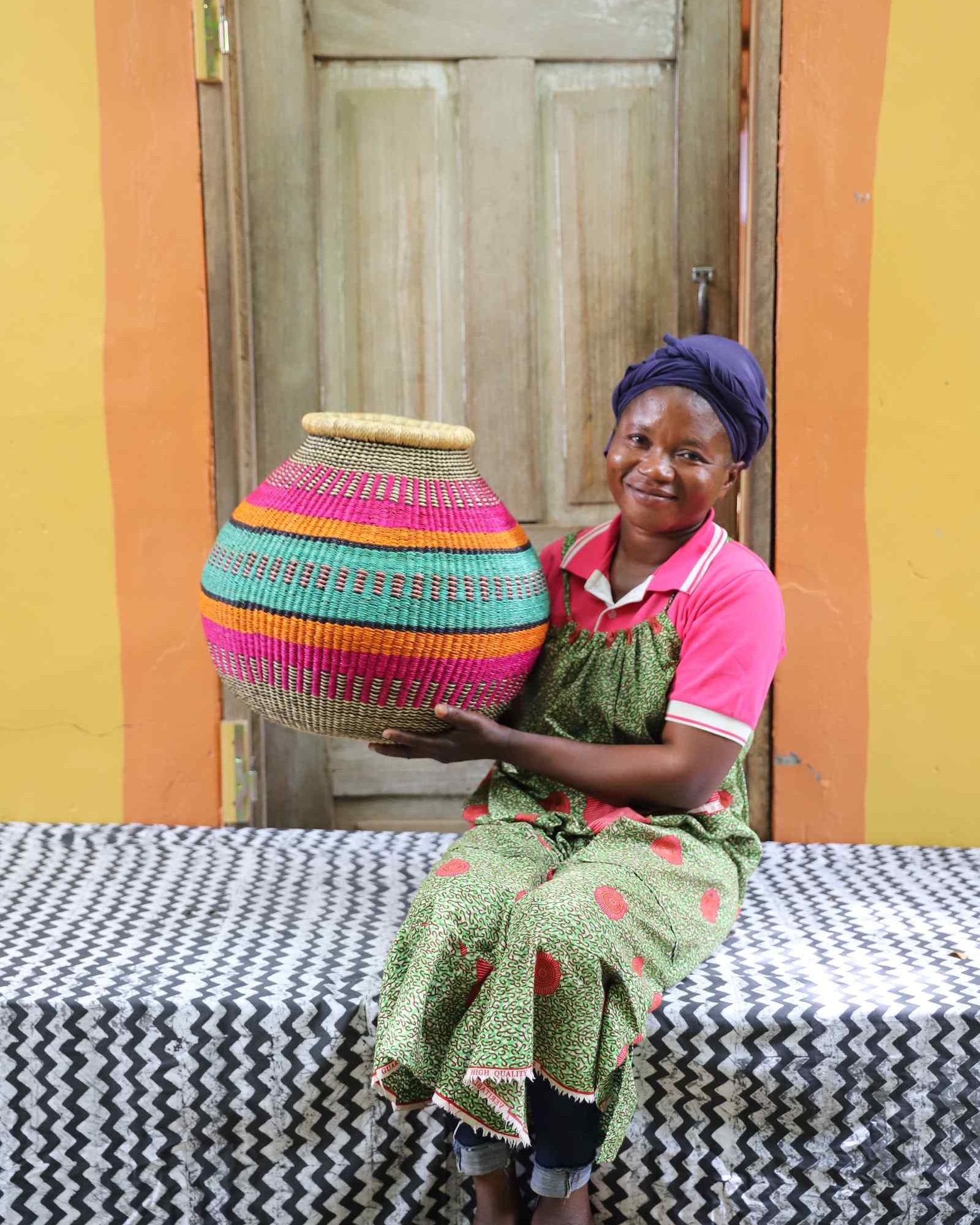 Round Bolga basket with geometric motif displayed as home Décor statement piece