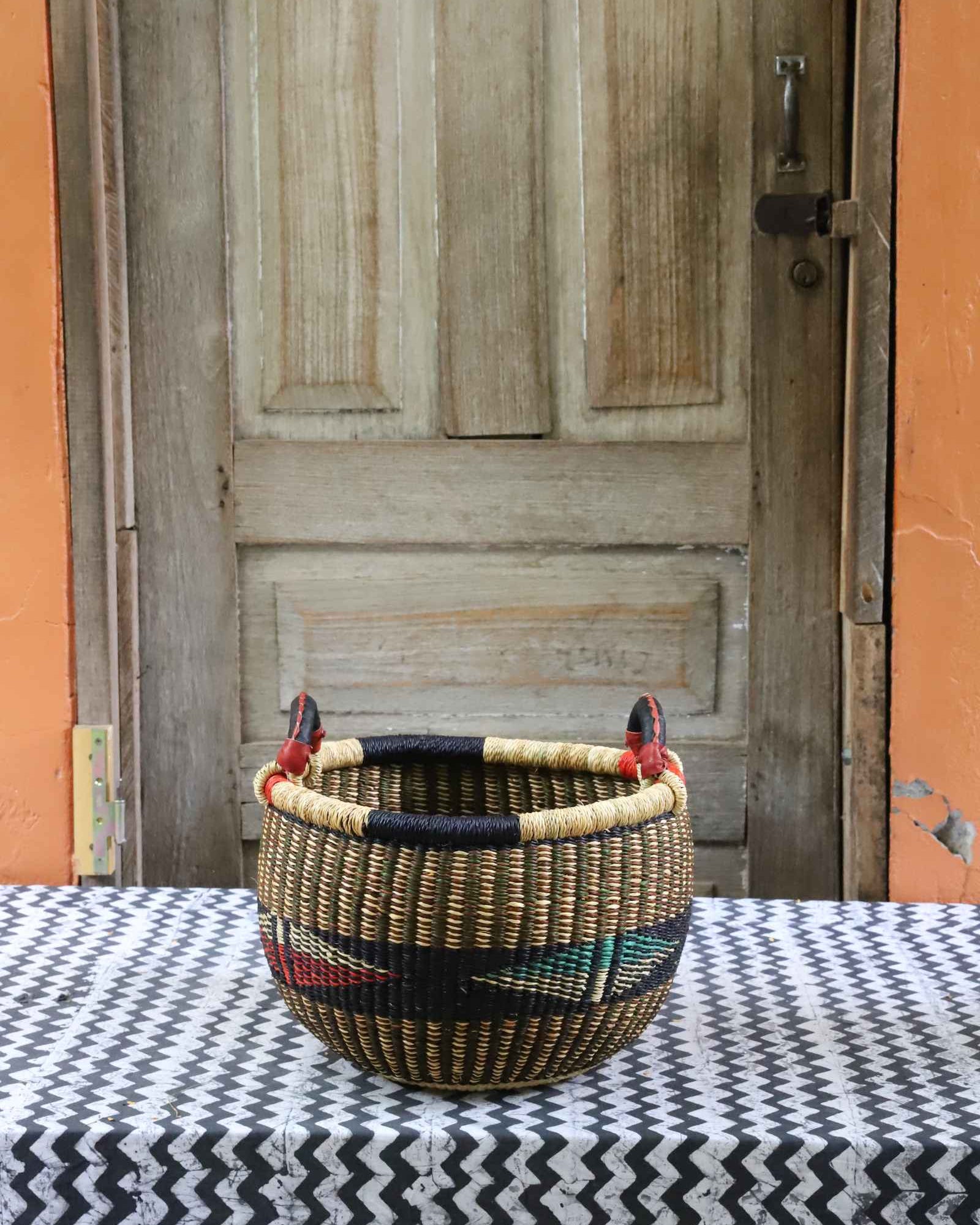Small Gbenka storage basket in elephant grass, a handwoven Bolga basket 34 cm wide.