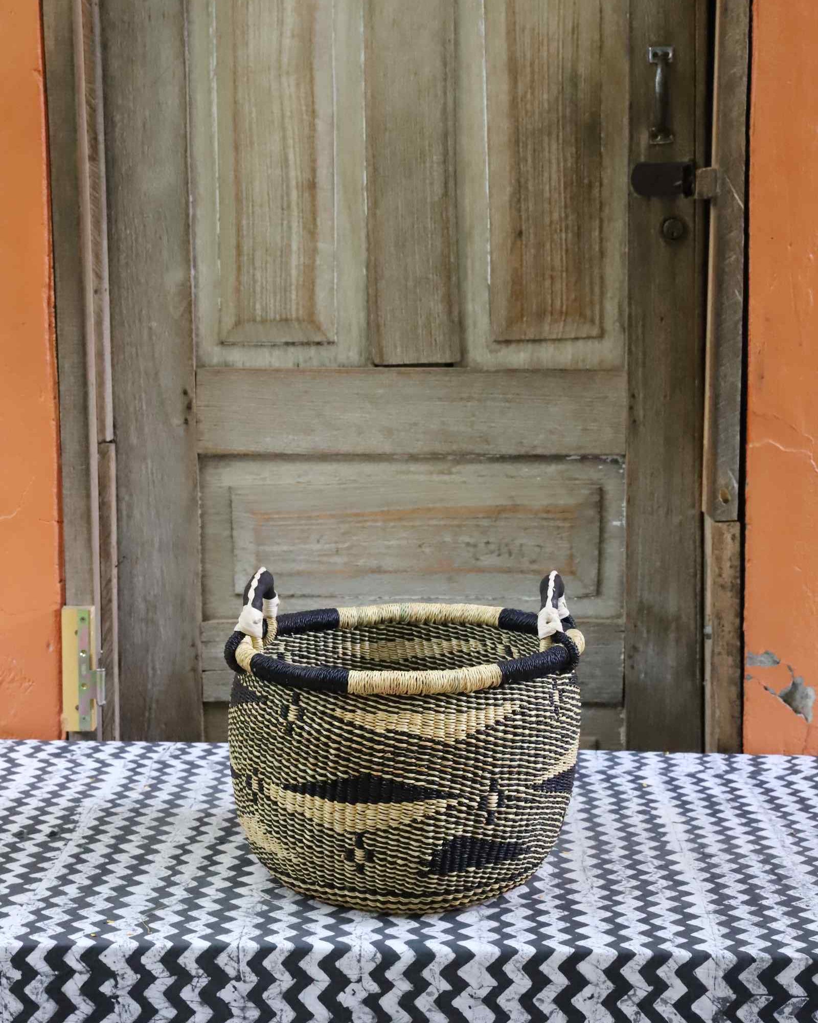 Gbenka storage basket handwoven in elephant grass from Bolgatanga, Ghana, 36 cm wide.