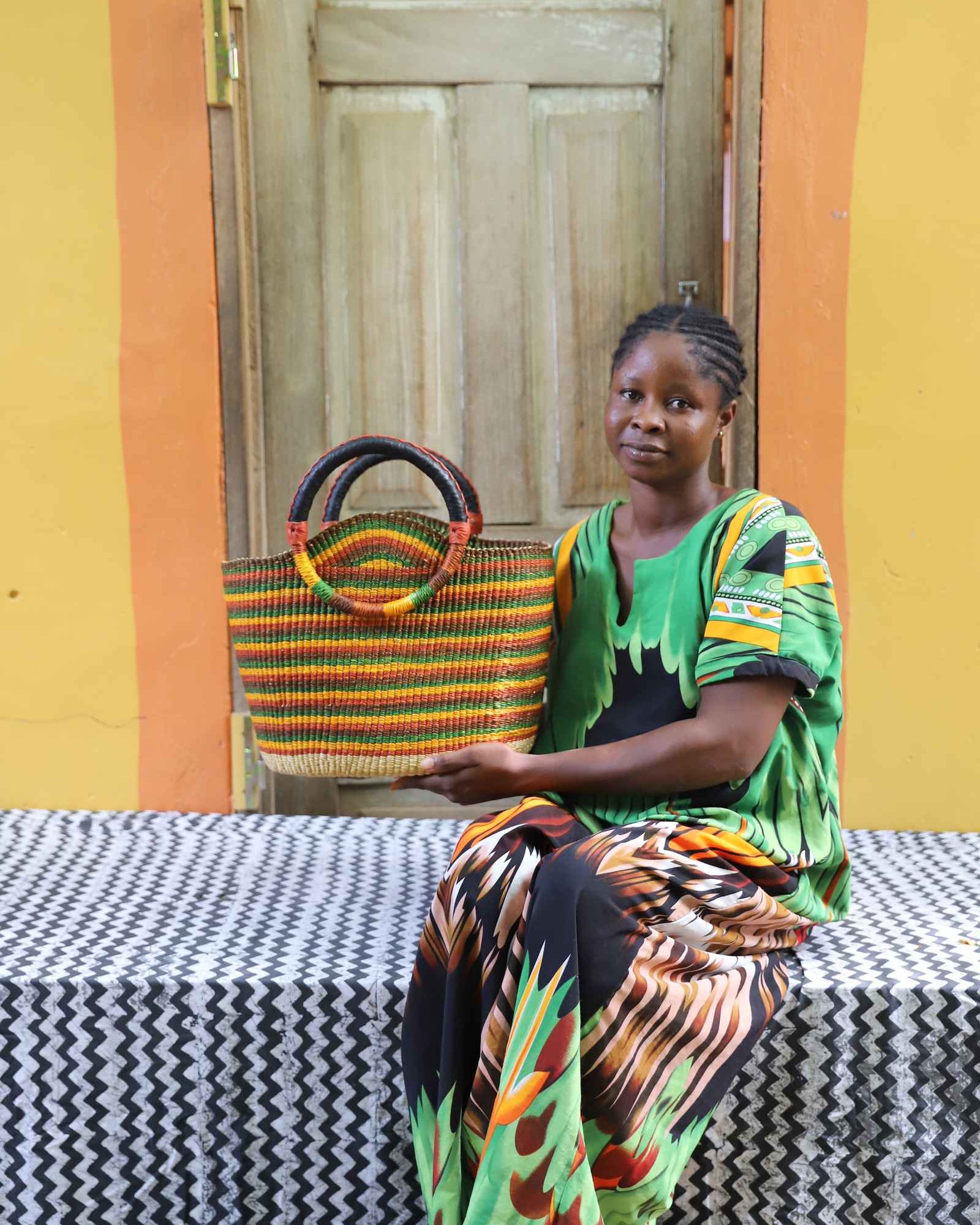 Naughty George handwoven carryall bag styled in a home setting
