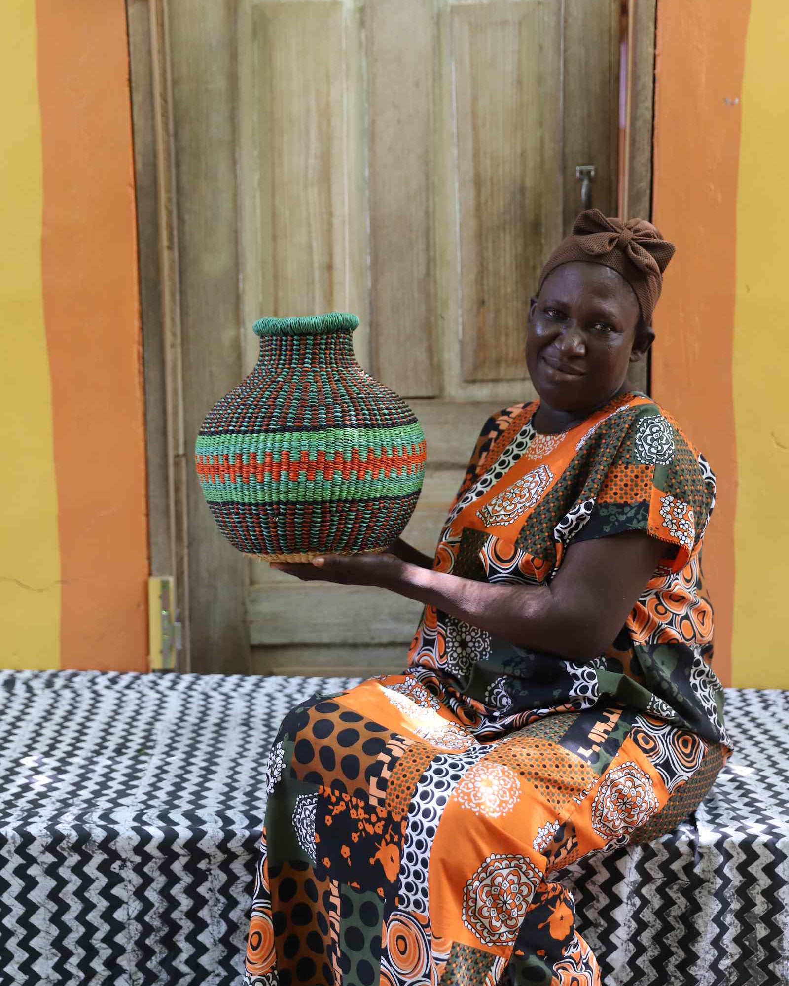 Jemima '10 Cows' tiny handwoven Décor basket displayed in a home setting