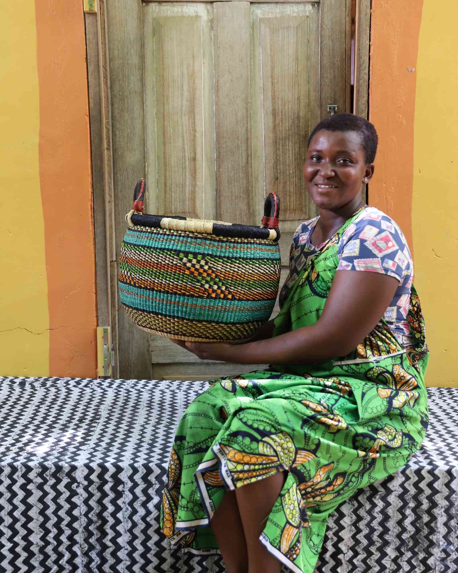 Gbenka handwoven African storage basket styled in a home interior