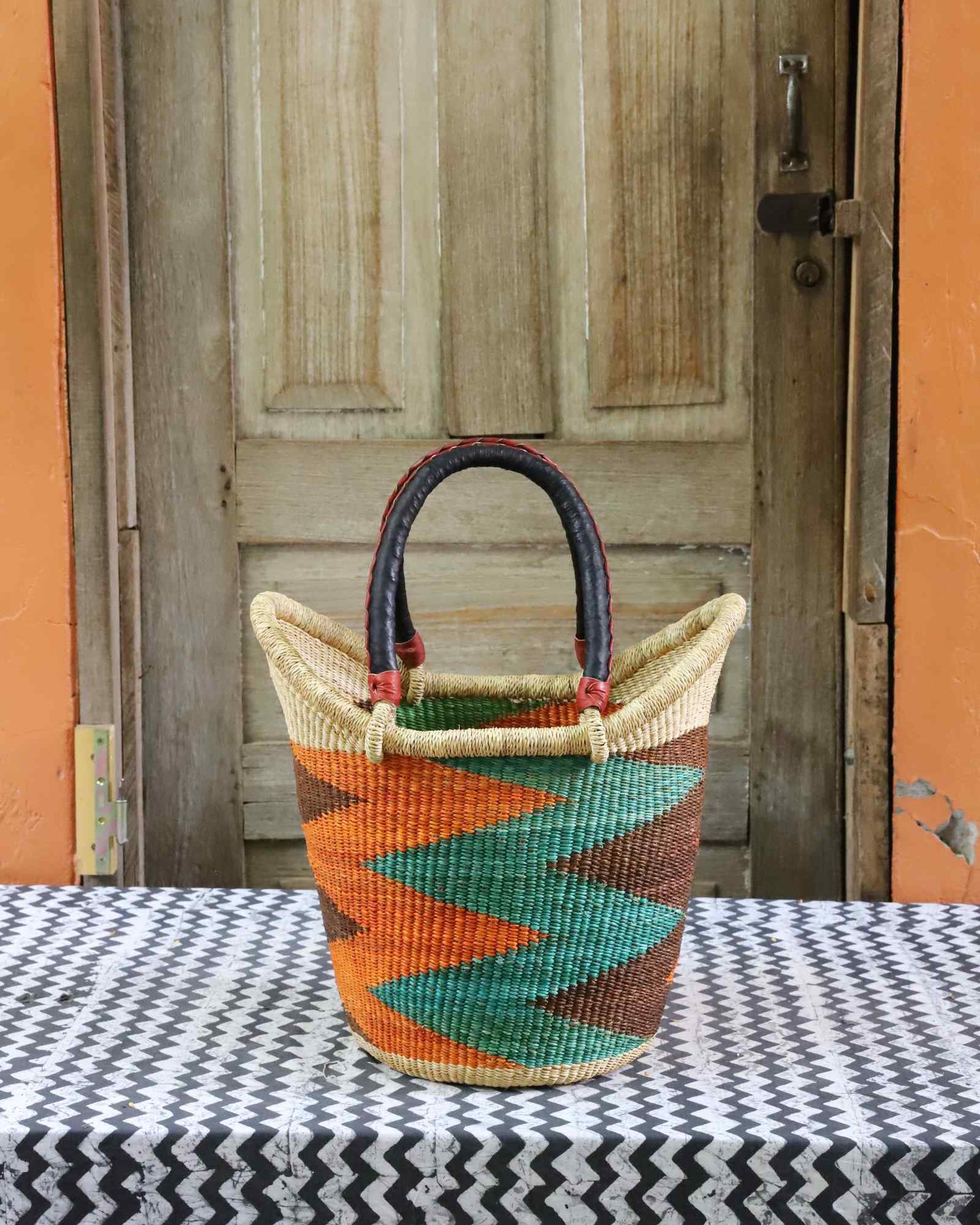 Nyariga shopping basket, a handwoven Bolga basket in elephant grass with a coil-woven rim.