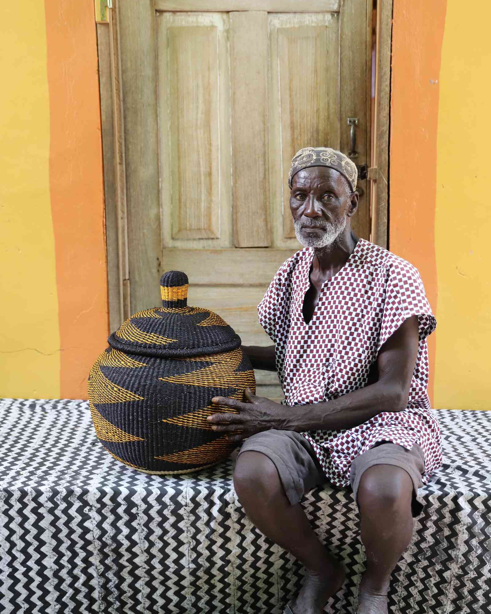 Medium Orbit handwoven African basket displayed in a home interior