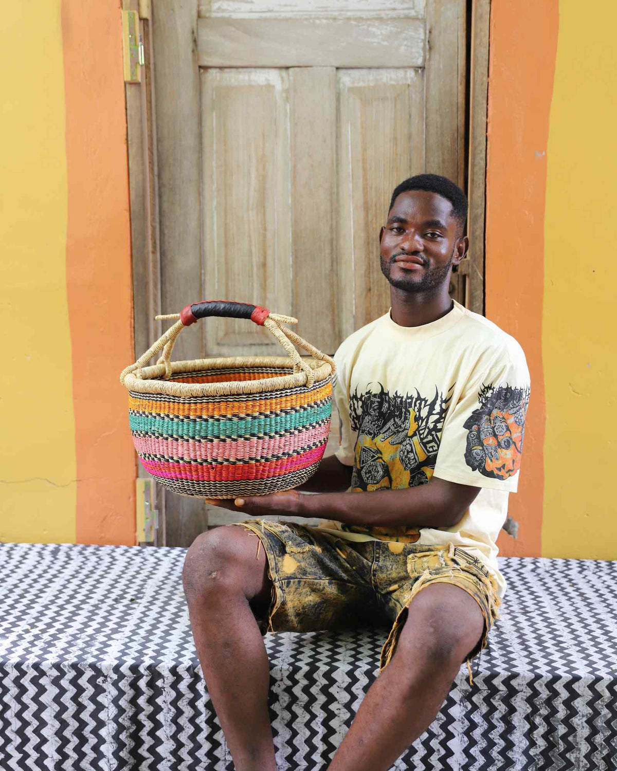 Handwoven African basket in elephant grass, round in form with a tight, strong weave.