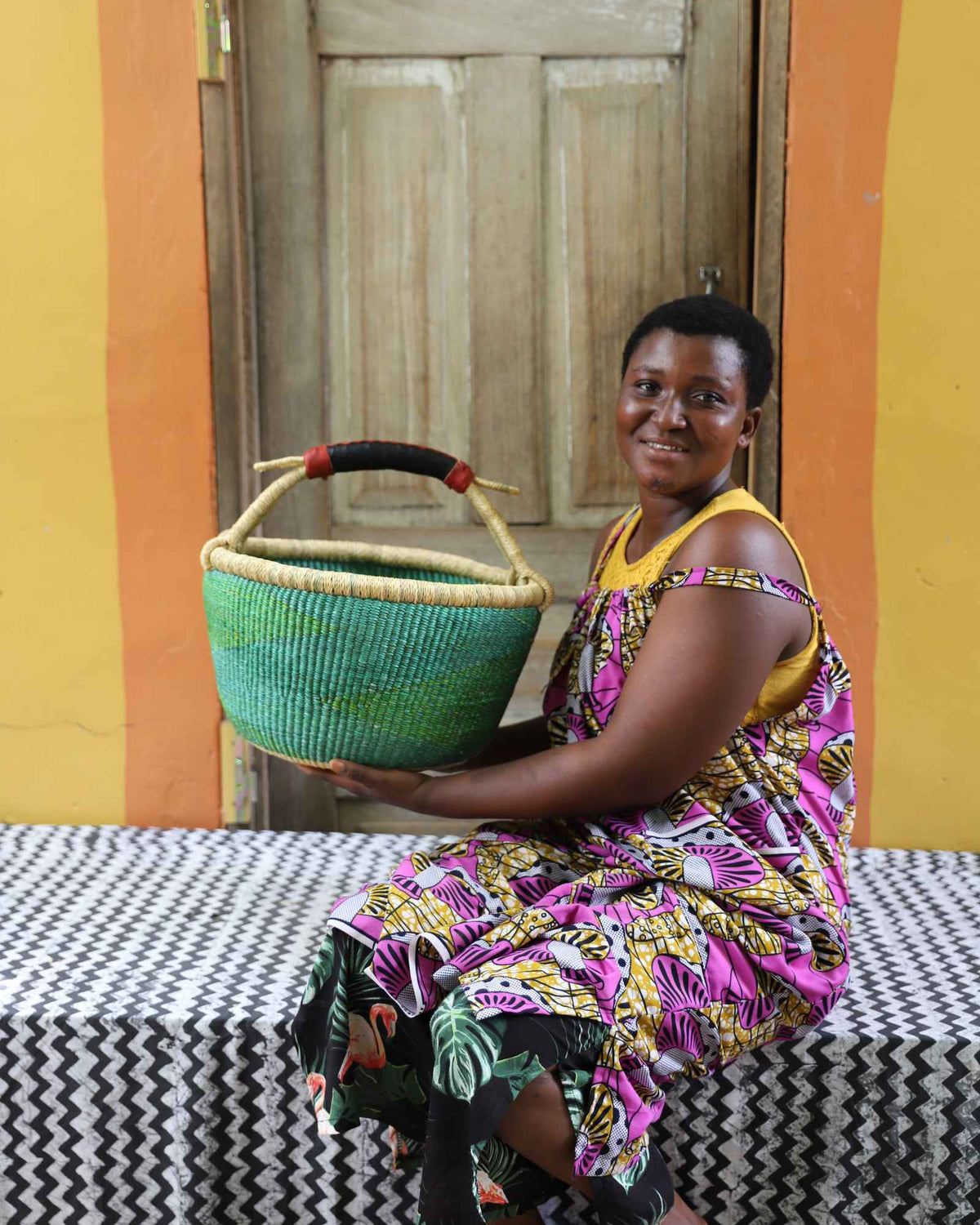 Medium woven basket in elephant grass, 38 cm wide, a catch-all for the home.