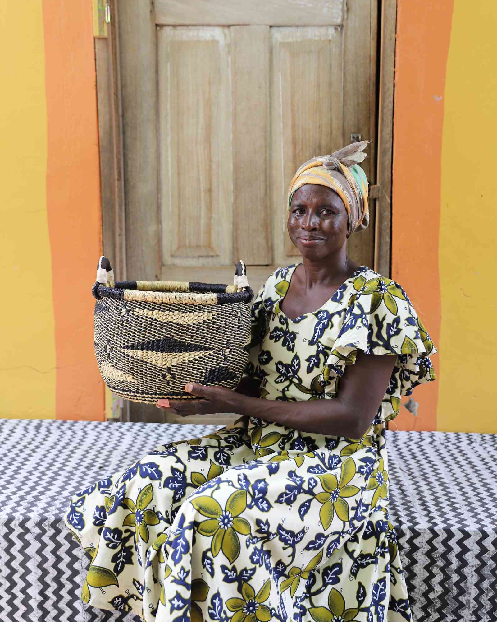 Handwoven Bolga storage basket in elephant grass, based on the traditional pito sieve.