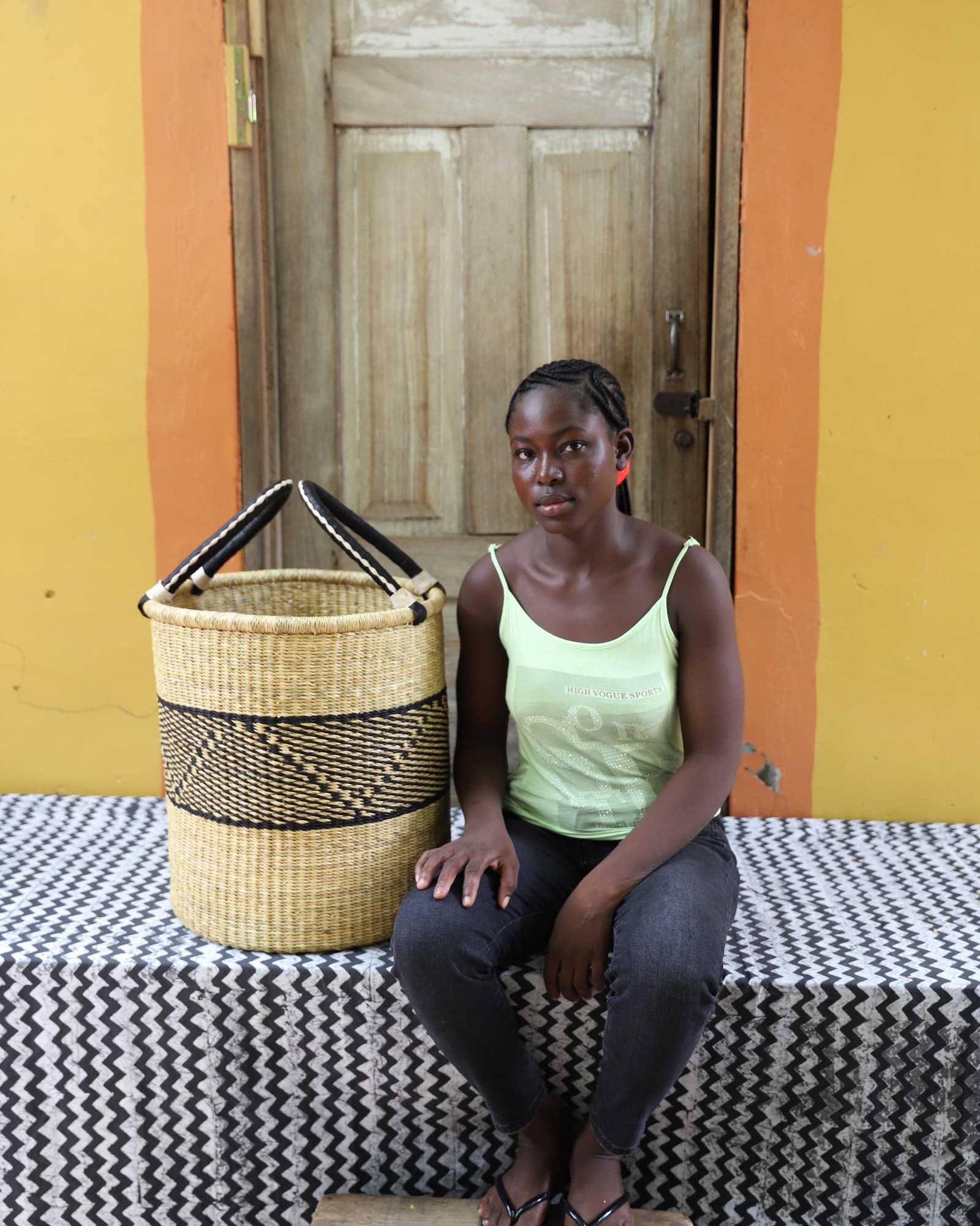 Open-top woven laundry basket in elephant grass from Bolgatanga, Ghana.