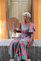 The Baba Tree Bolga Original Fan: Handwoven architectural wall art with intricate weave and premium leather handle.