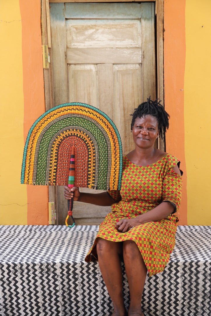 Naba Pengo Fan by The Baba Tree. Premium handwoven elephant grass wall art and artisanal Bolgatanga home decor.