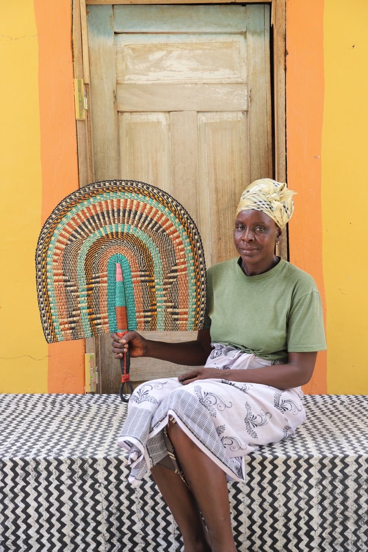 Naba Pengo Fan by The Baba Tree. Premium handwoven elephant grass wall art and artisanal Bolgatanga home decor.