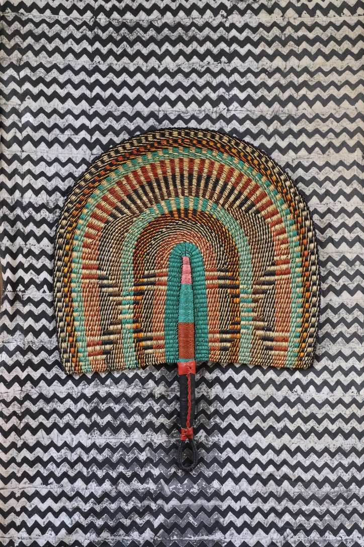 Naba Pengo Fan by The Baba Tree. Premium handwoven elephant grass wall art and artisanal Bolgatanga home decor.