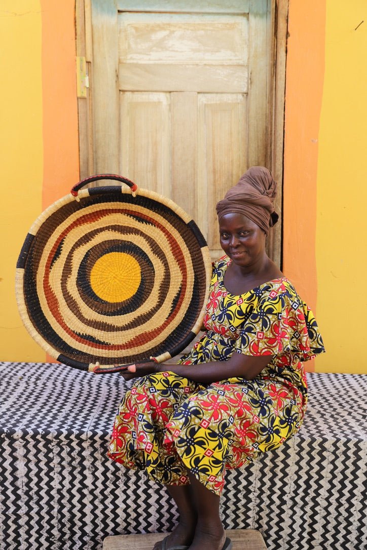Premium elephant grass tray with leather handles. Bolgatanga artisan craftsmanship.