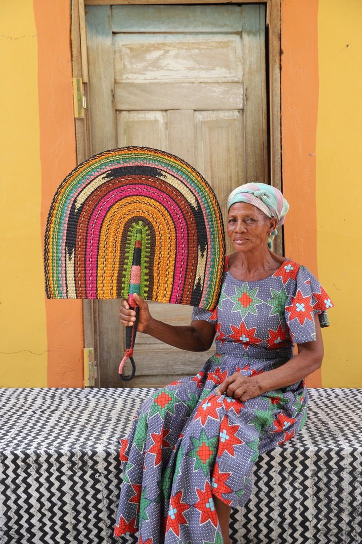Naba Pengo Fan by The Baba Tree. Premium handwoven elephant grass wall art and artisanal Bolgatanga home decor.