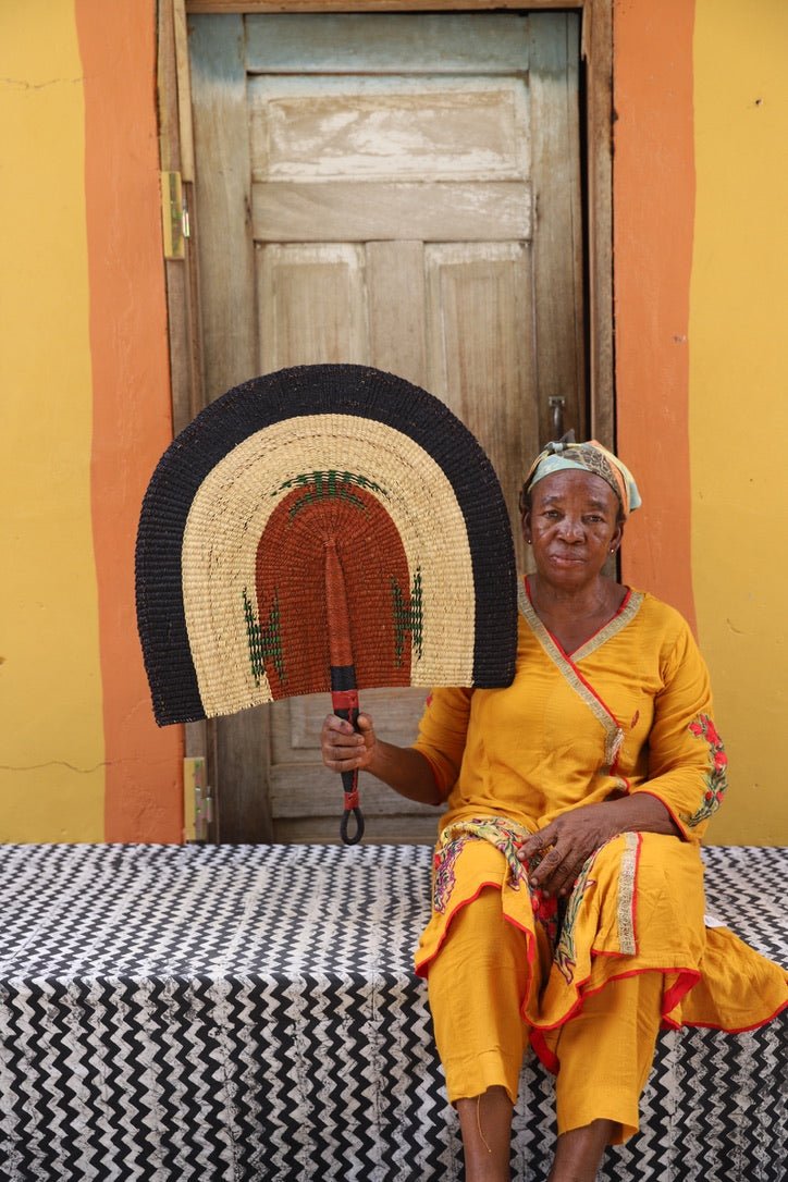 Naba Pengo Fan by The Baba Tree. Premium handwoven elephant grass wall art and artisanal Bolgatanga home decor.
