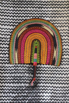 Naba Pengo Fan by The Baba Tree. Premium handwoven elephant grass wall art and artisanal Bolgatanga home decor.