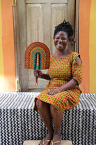 The Baba Tree Bolga Original Fan: Handwoven architectural wall art with intricate weave and premium leather handle.