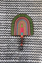 The Baba Tree Bolga Original Fan: Handwoven architectural wall art with intricate weave and premium leather handle.