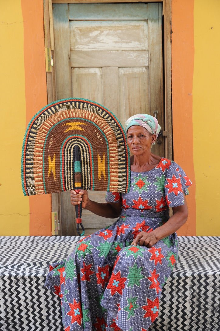 Naba Pengo Fan by The Baba Tree. Premium handwoven elephant grass wall art and artisanal Bolgatanga home decor.