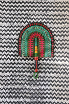 The Baba Tree Bolga Original Fan: Handwoven architectural wall art with intricate weave and premium leather handle.