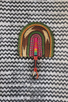 The Baba Tree Bolga Original Fan: Handwoven architectural wall art with intricate weave and premium leather handle.