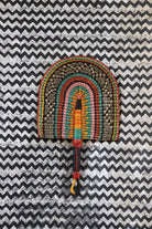 The Baba Tree Bolga Original Fan: Handwoven architectural wall art with intricate weave and premium leather handle.