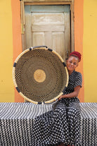 Woven Tray Wall Decor (Large) by The Baba Tree. Premium elephant grass tray with leather handles. Bolgatanga artisan craftsmanship.