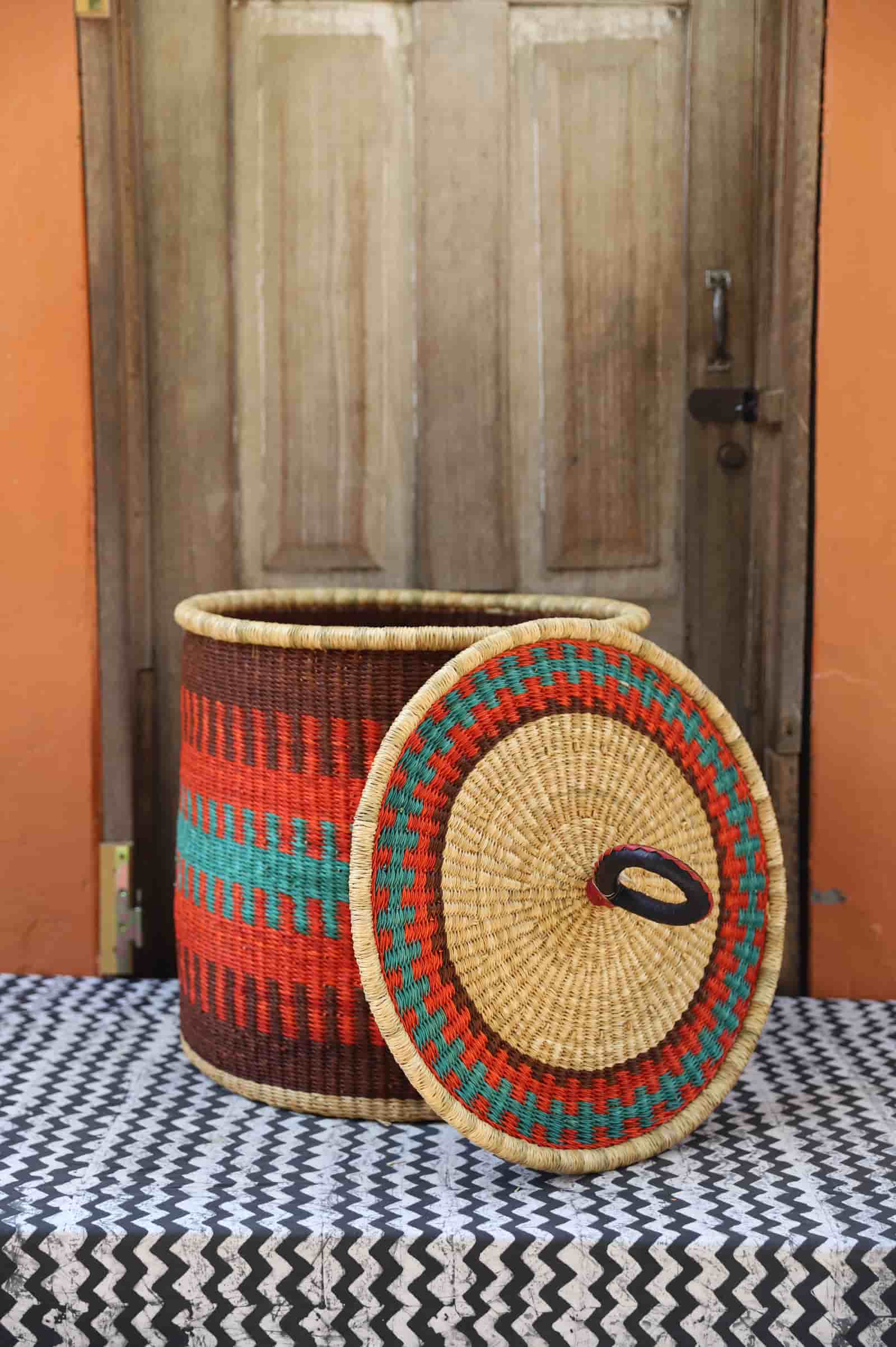 Woven basket with colorful patterns on a patterned surface
