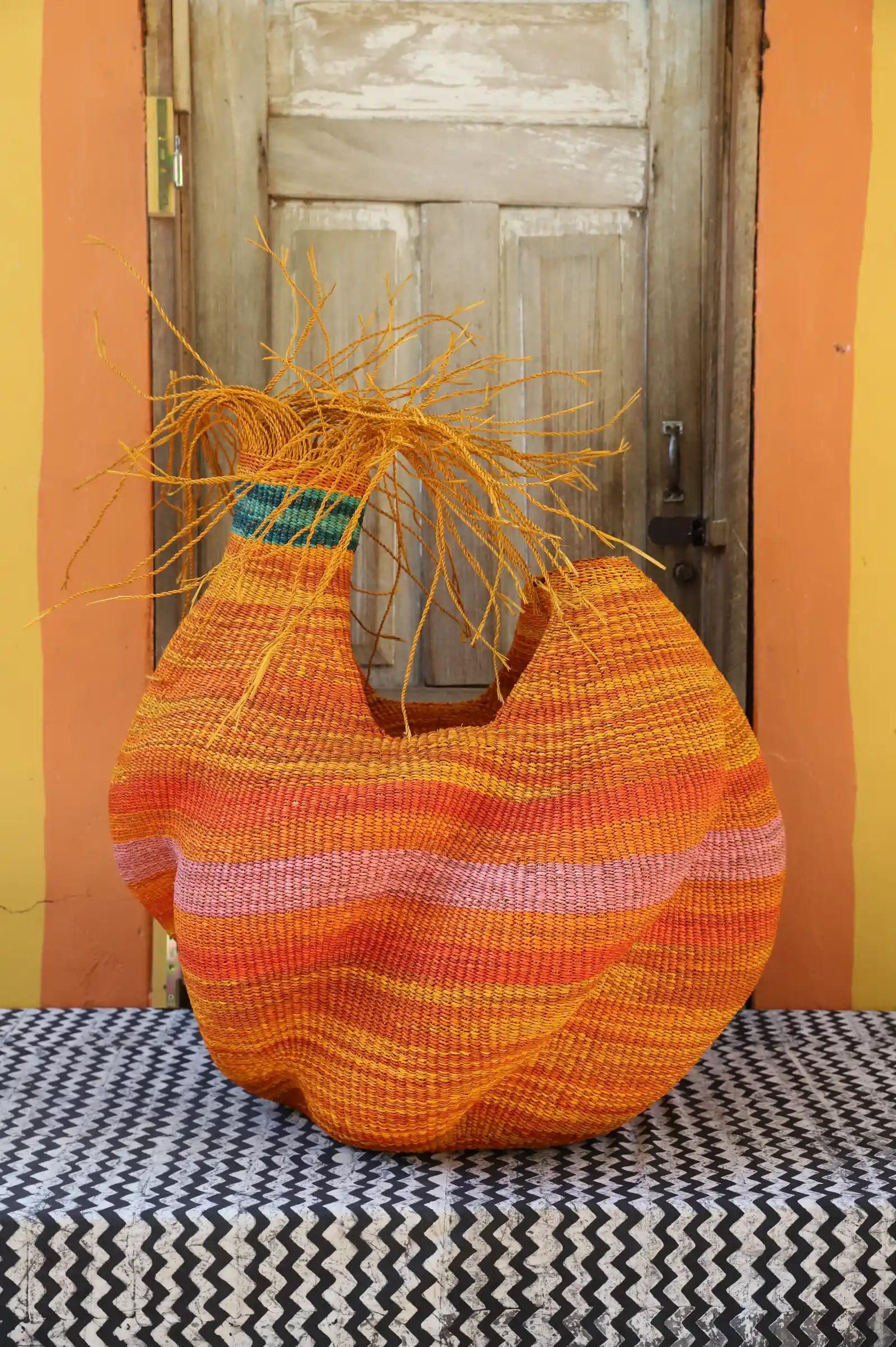 Woman and Man Art Basket by Mary Ayinbora