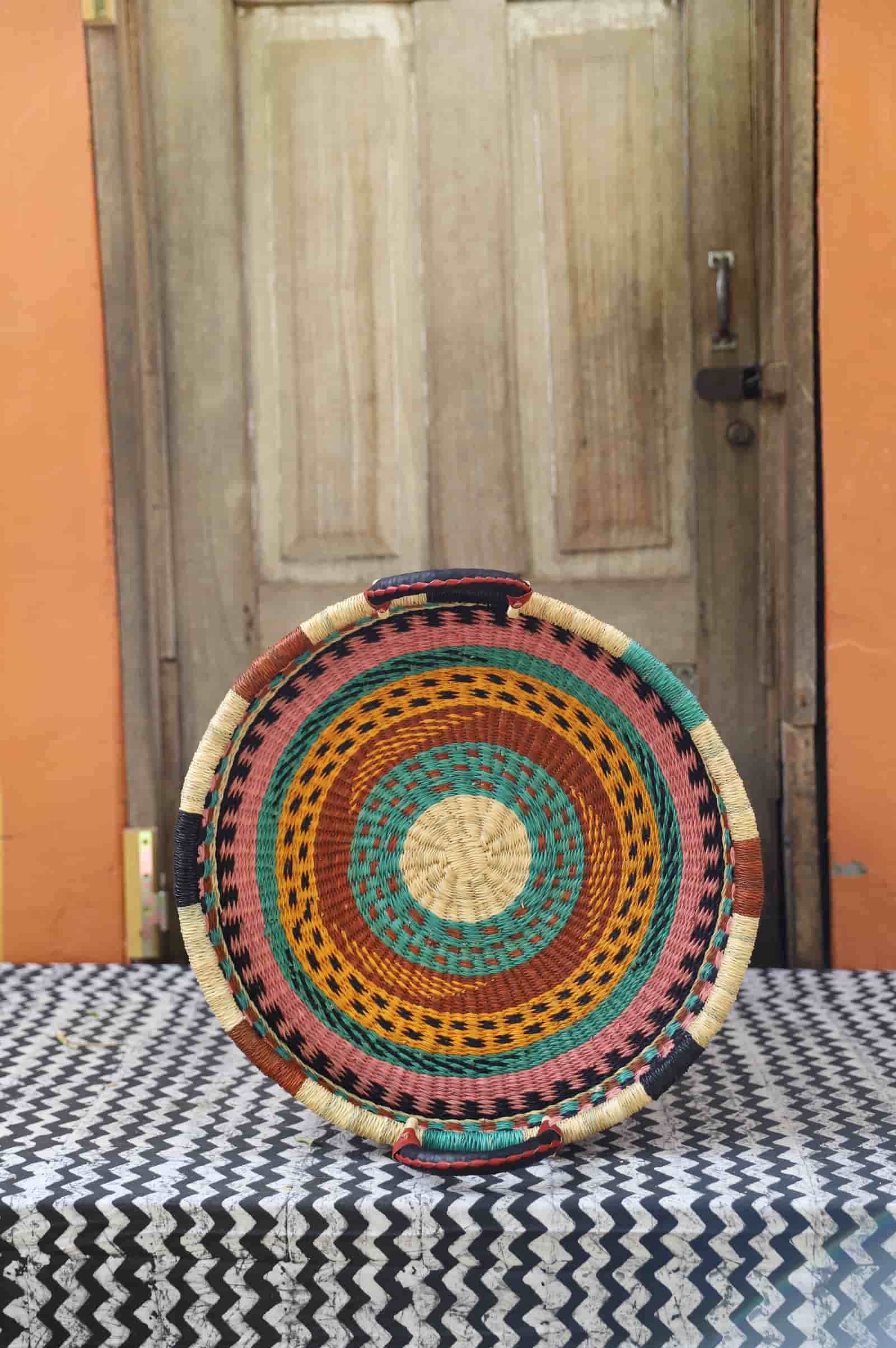 Woven Tray Wall Decor (Small) by The Baba Tree. Premium elephant grass tray with leather handles. Bolgatanga artisan craftsmanship.