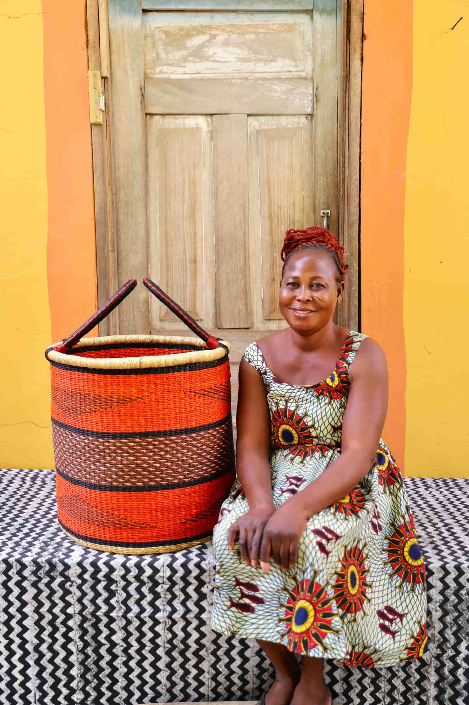 Open Laundry Basket (Large) by The Baba Tree. Handwoven elephant grass storage with leather handles. Bolgatanga artisan decor.