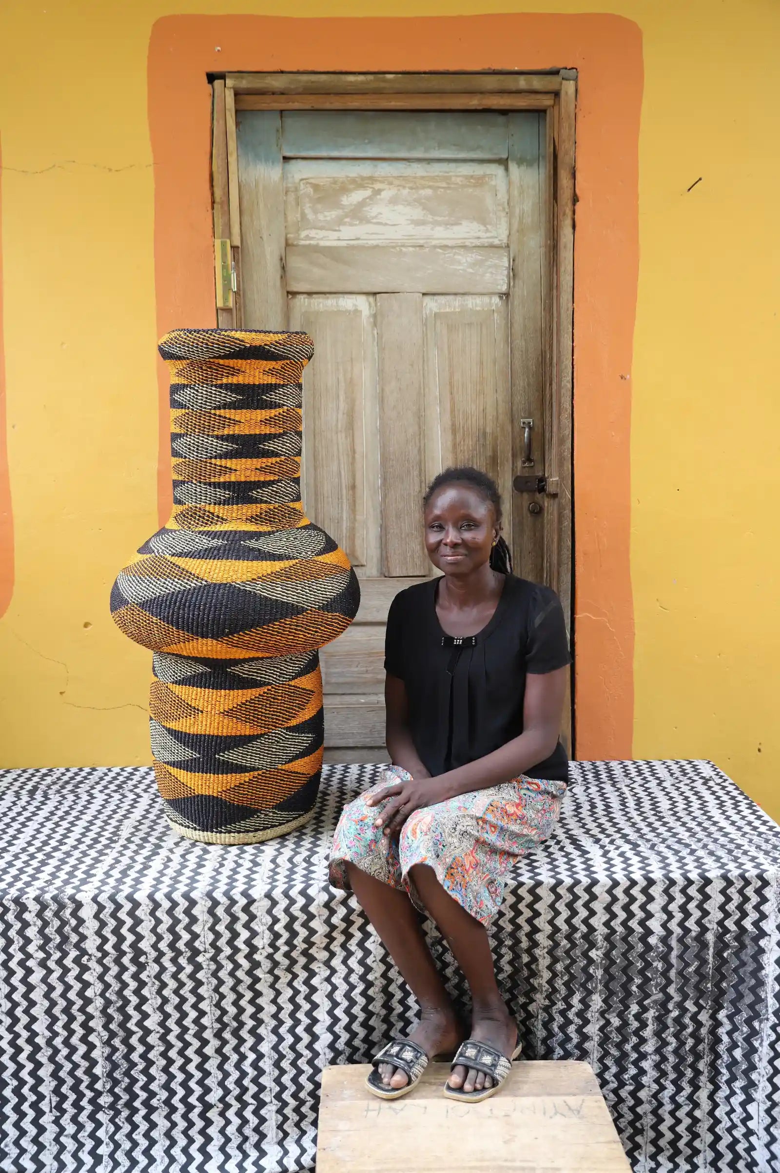 Tall Dugla Art Basket by Ndita Agobka