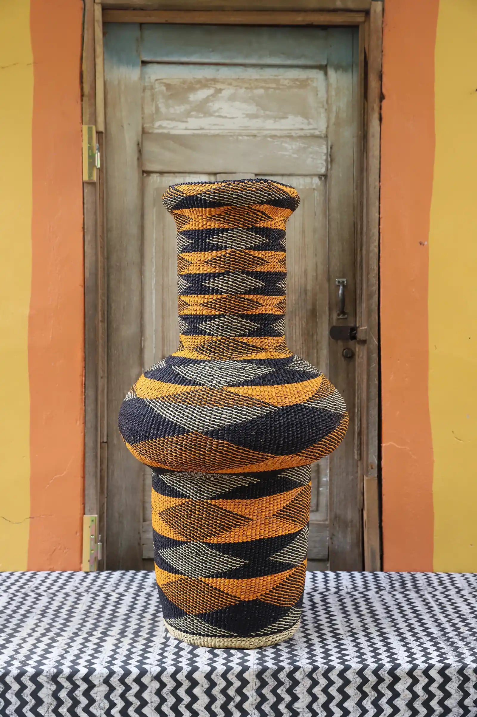 Tall Dugla Art Basket by Ndita Agobka