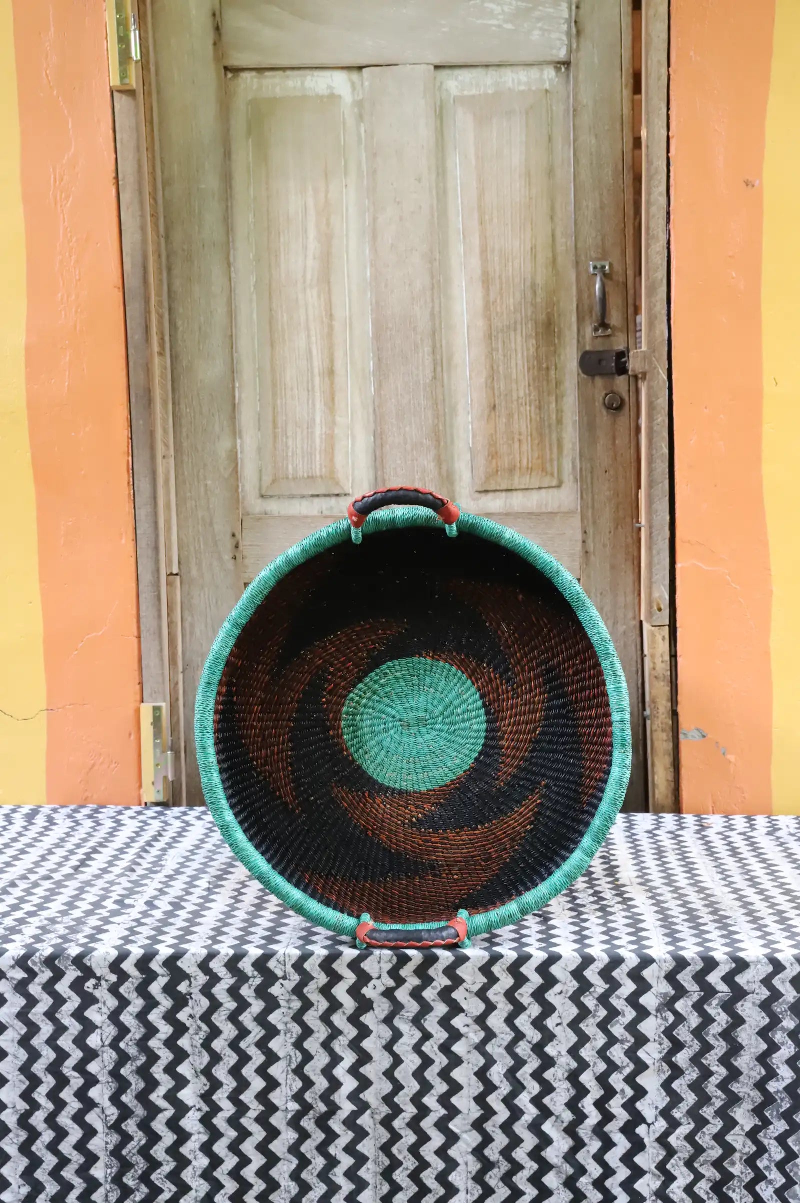Woven Tray Wall Decor (Large) by The Baba Tree. Premium elephant grass tray with leather handles. Bolgatanga artisan craftsmanship.