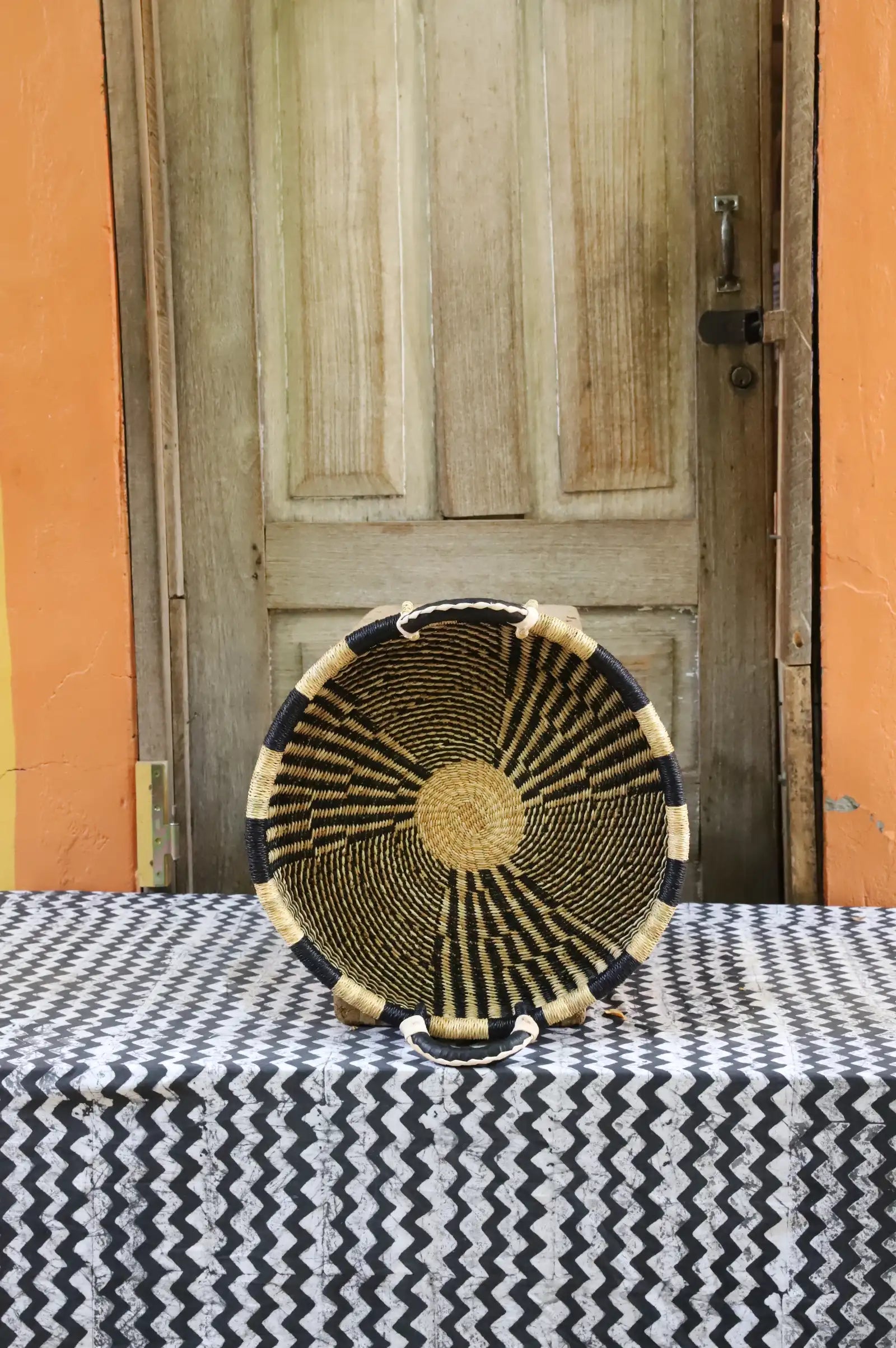 Woven Tray Wall Decor (Large) by The Baba Tree. Premium elephant grass tray with leather handles. Bolgatanga artisan craftsmanship.