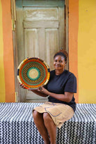 Woven Tray Wall Decor (Large) by The Baba Tree. Premium elephant grass tray with leather handles. Bolgatanga artisan craftsmanship.