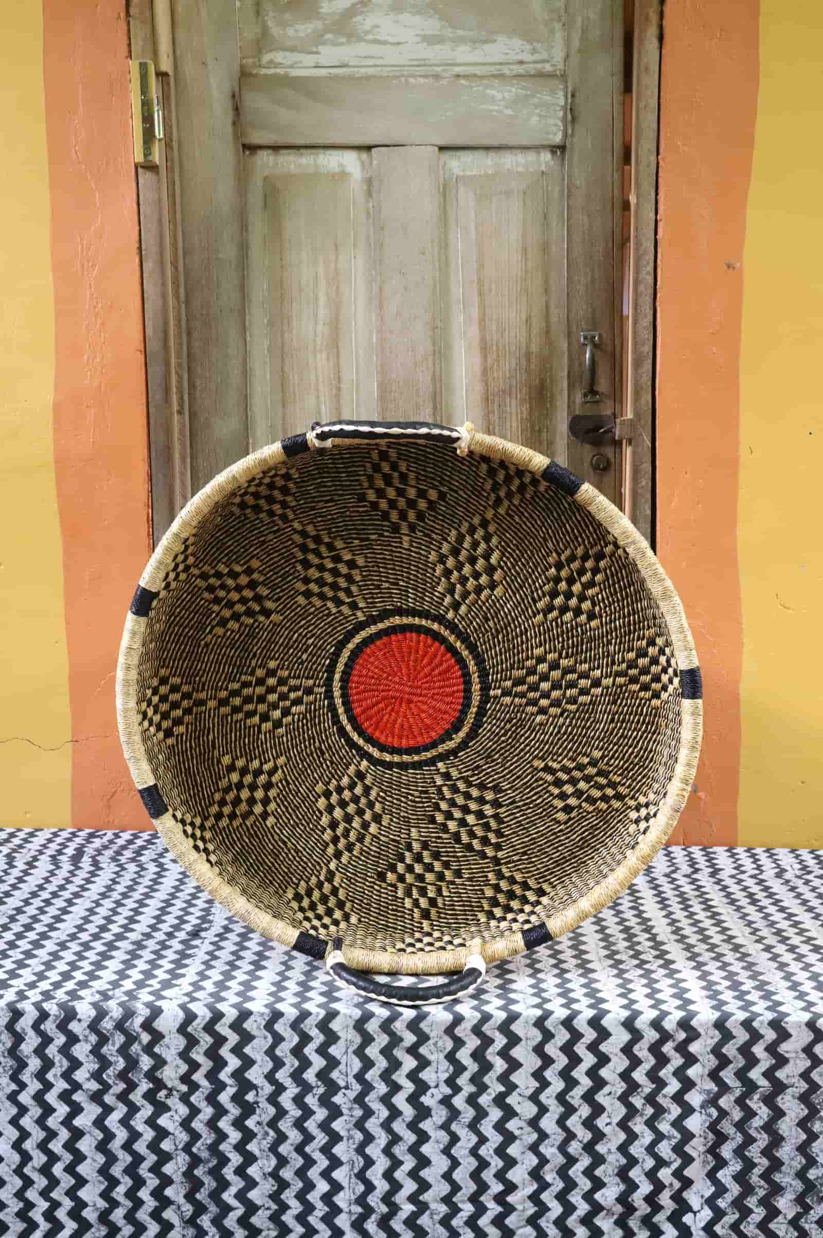 Handwoven architectural wall art with intricate weave and premium leather handle.