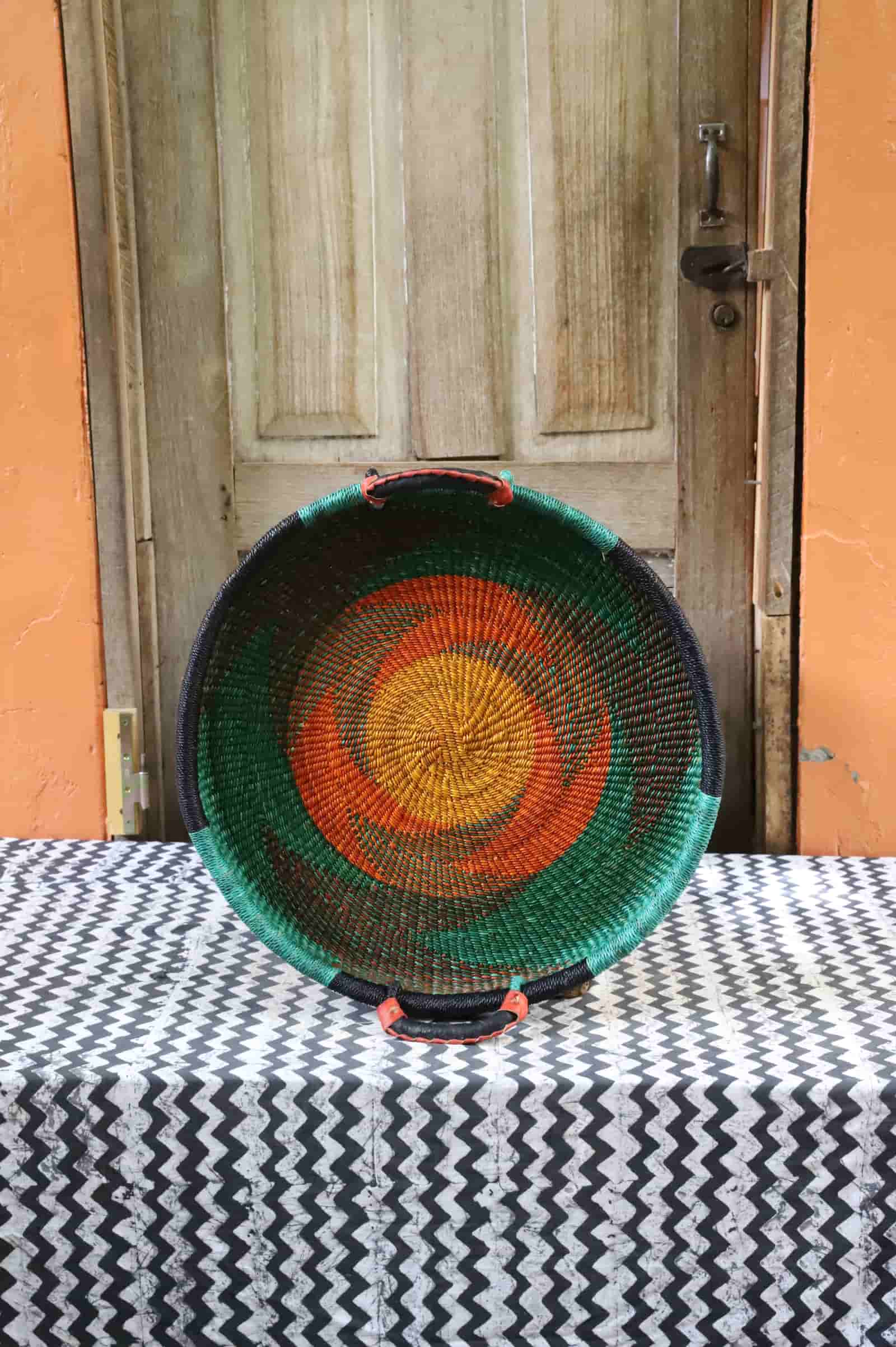 Handwoven architectural wall art with intricate weave and premium leather handle.