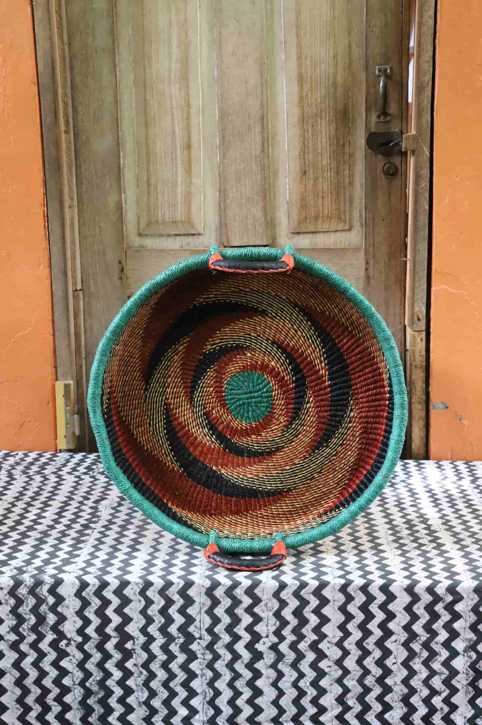 Handwoven architectural wall art with intricate weave and premium leather handle.