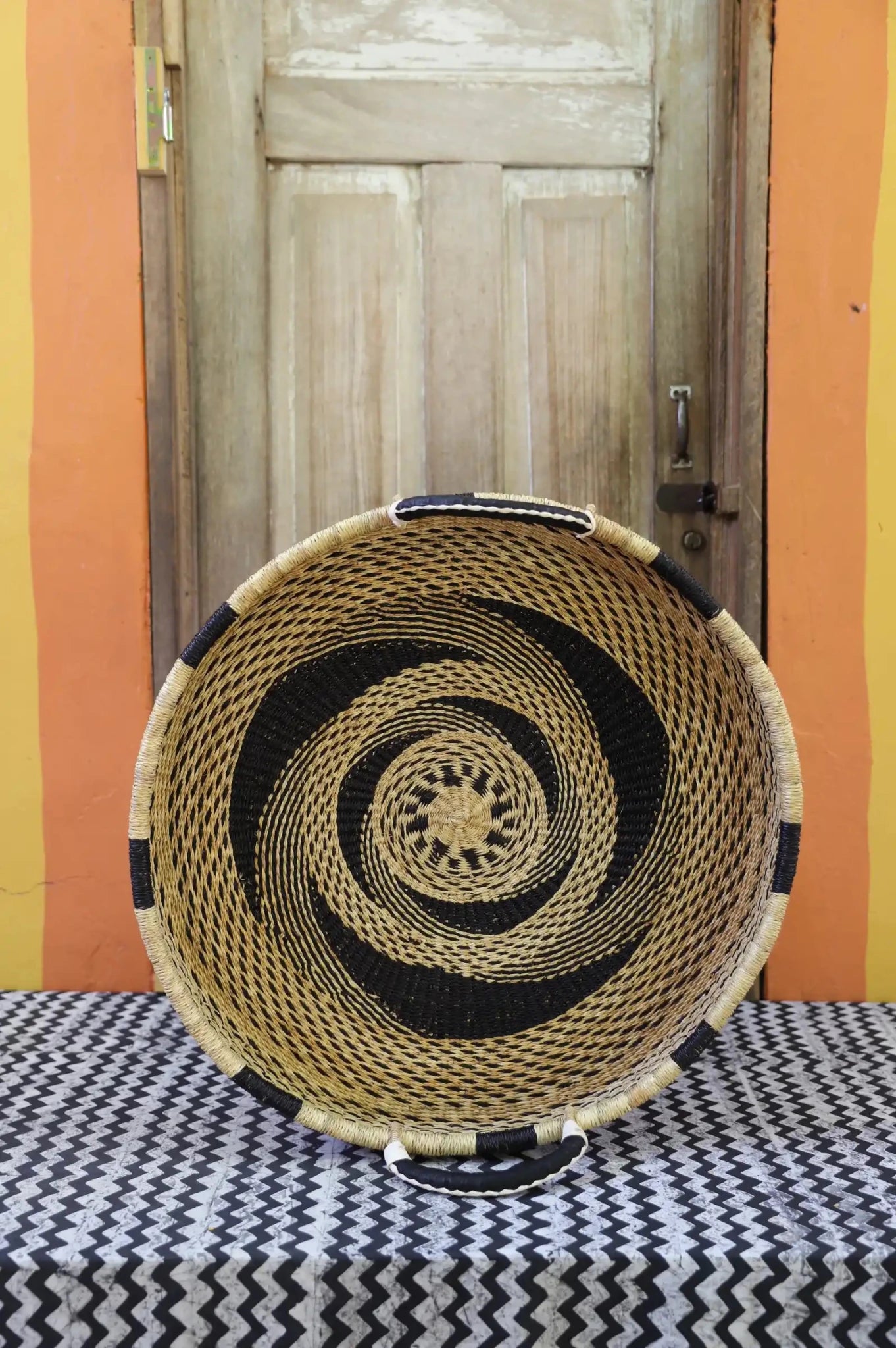 Woven Tray Wall Decor (Large) by The Baba Tree. Premium elephant grass tray with leather handles. Bolgatanga artisan craftsmanship.